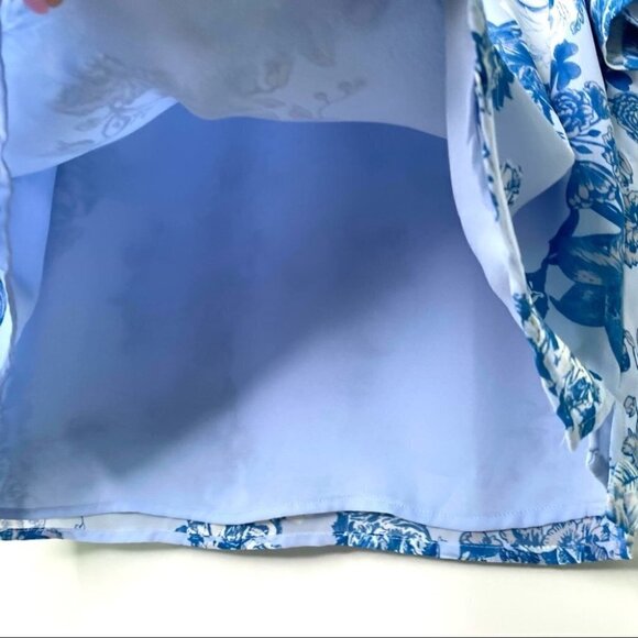 Vince Camuto  floral print top with v-neckline and short sleeves - Picture 8 of 10